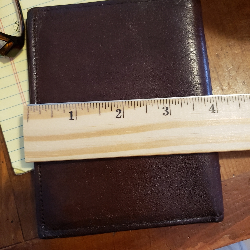 Rolfs cowhide leather billfold. Flat and fits nicely in a small purse.